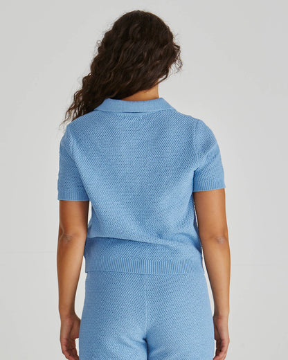 Back view of Lady wearing the SASS Aubrie Knit Polo in Blue. Available at Loloma Living, Tamborine Mountain - stockist of SASS and Betty Basics.