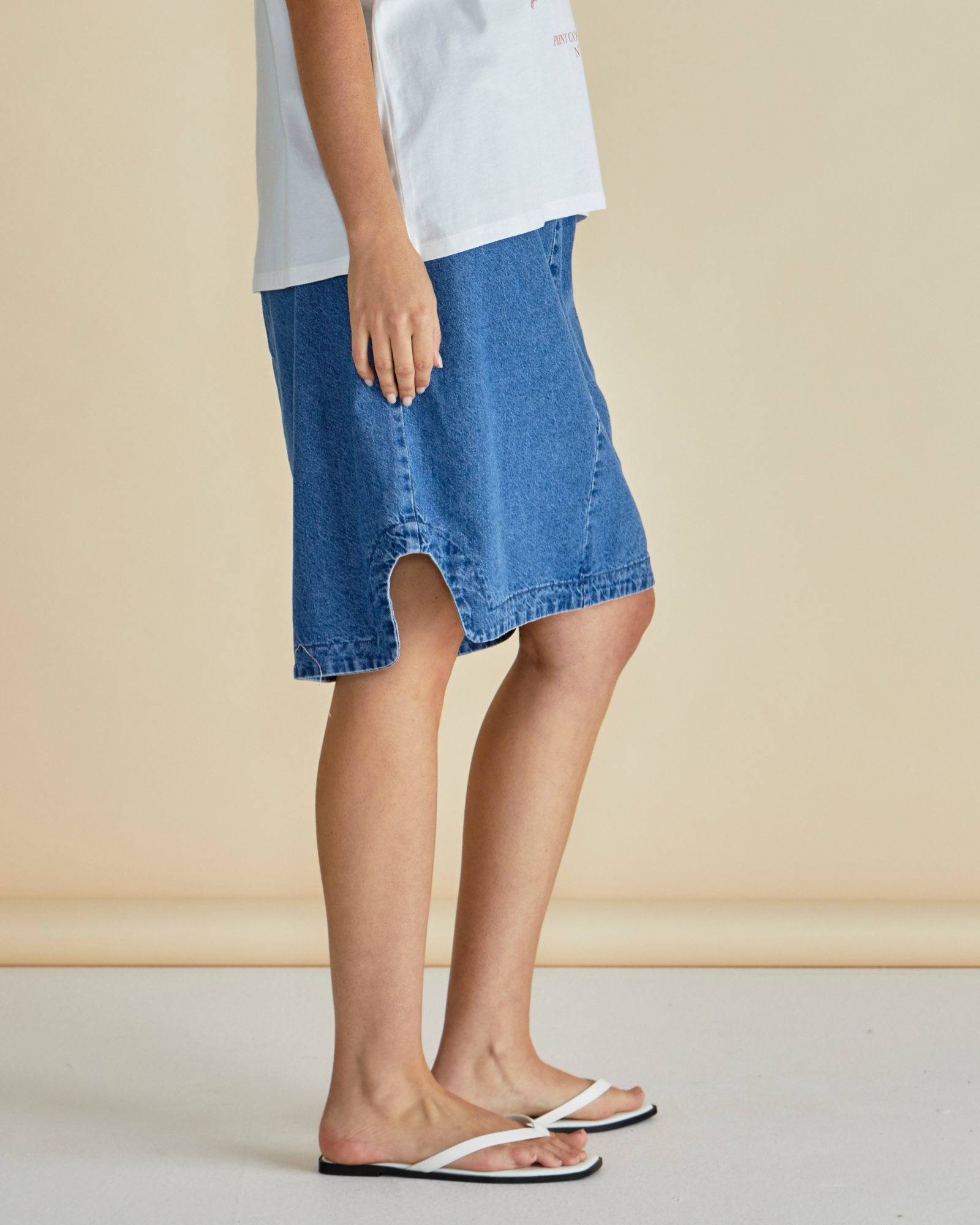 Shop the Dara Denim Elasticated Skirt by Betty Basics at Loloma Living Tamborine Mountain or online fast postage. Side view.