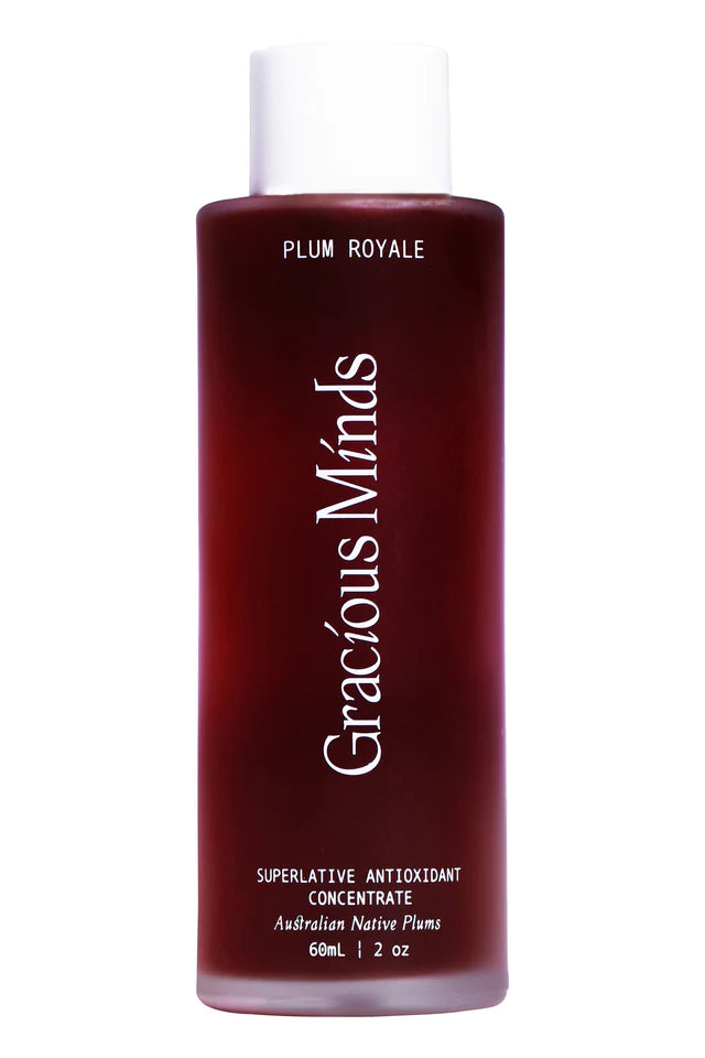 Close up of botanical serum being pressed into skin for glow and hydration. Plum Royale Superlative Antioxidant Concentrate by Gracious Minds skincare ritual.