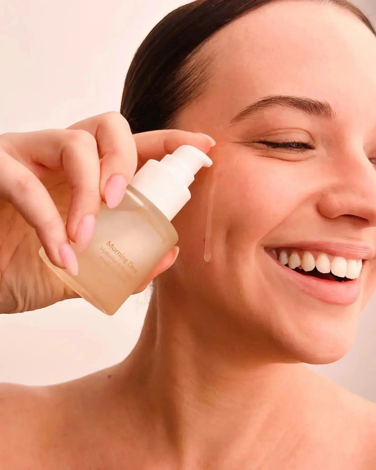 Applying Ms Morning Dew hydration serum for glowing skin
